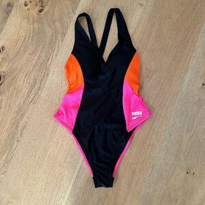 Puma Women's One-Piece Swimsuit in Black with Pink and Orange Accents